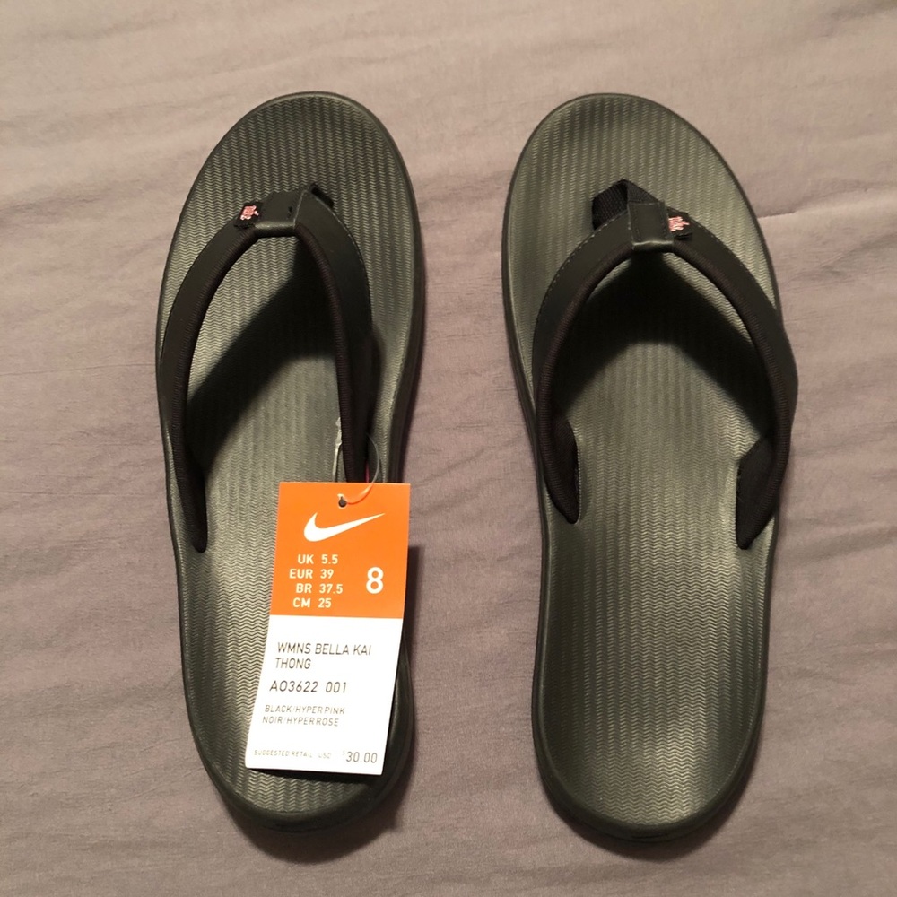 New Never Used Black Nike Flip Flops.